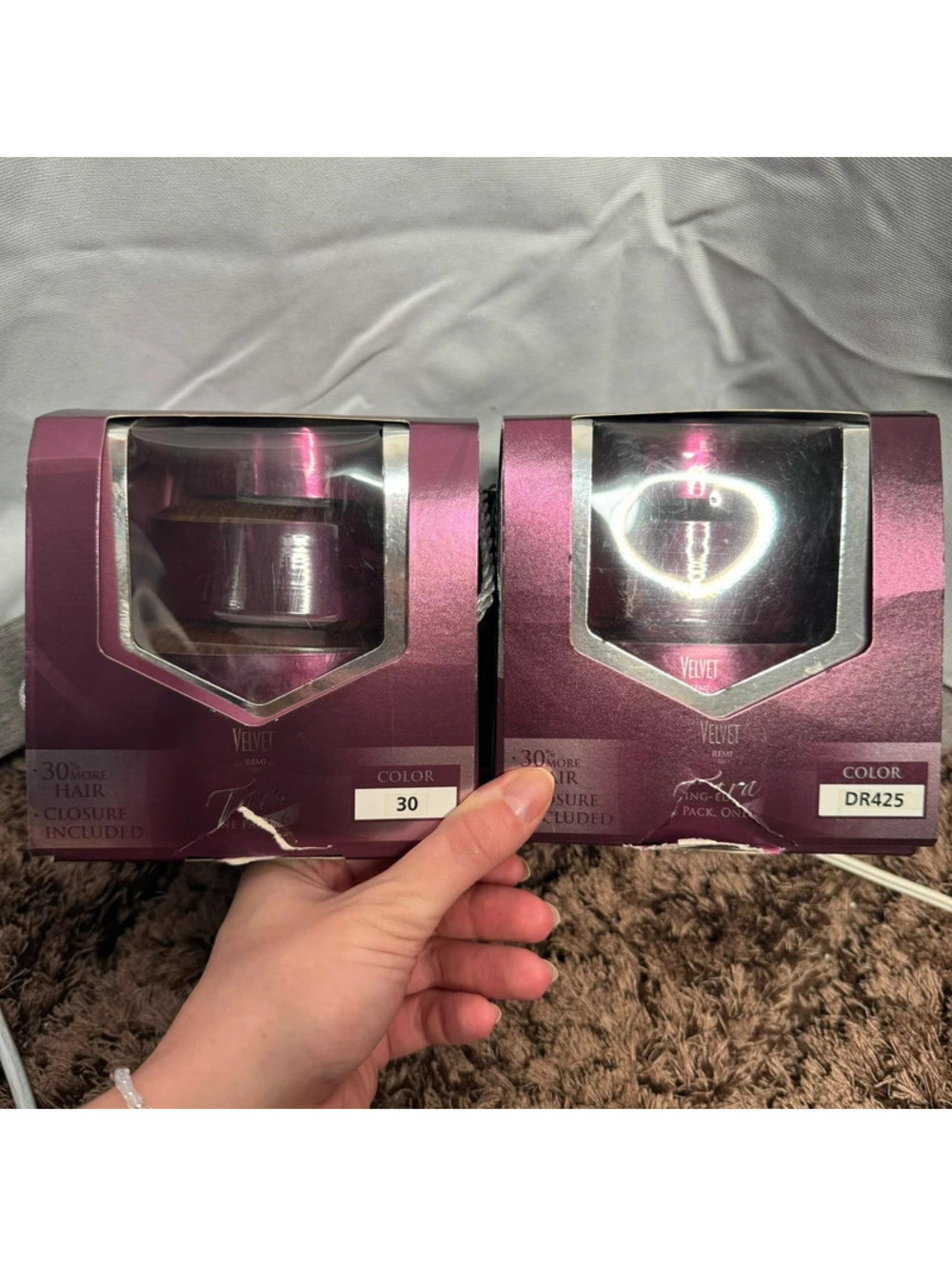 two boxes of Outre Velvet Remi Tara Hair Weaves